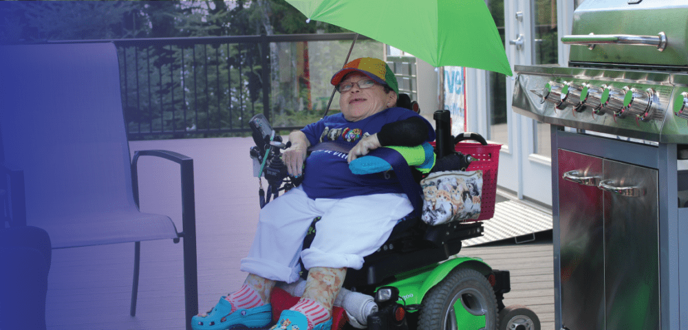 Person in wheelchair in front of Barbecue